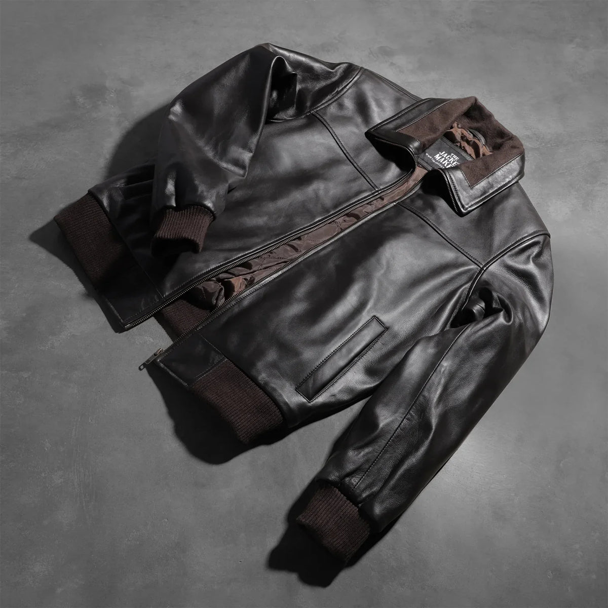 Rib Knit &amp; Hem Craftsmanship Construction Detail on Men's Air Rolf Mocha Brown Leather Bomber Jacket