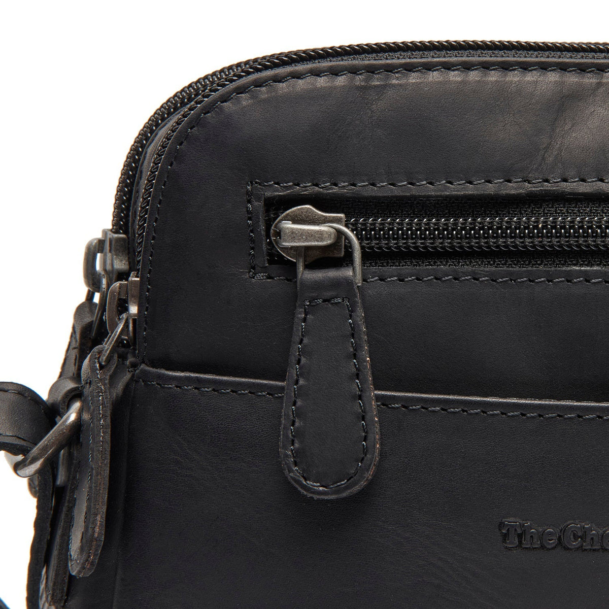 
Vionne Crossbody taske i læder - Bagfra med forstærkede læderremme og syninger