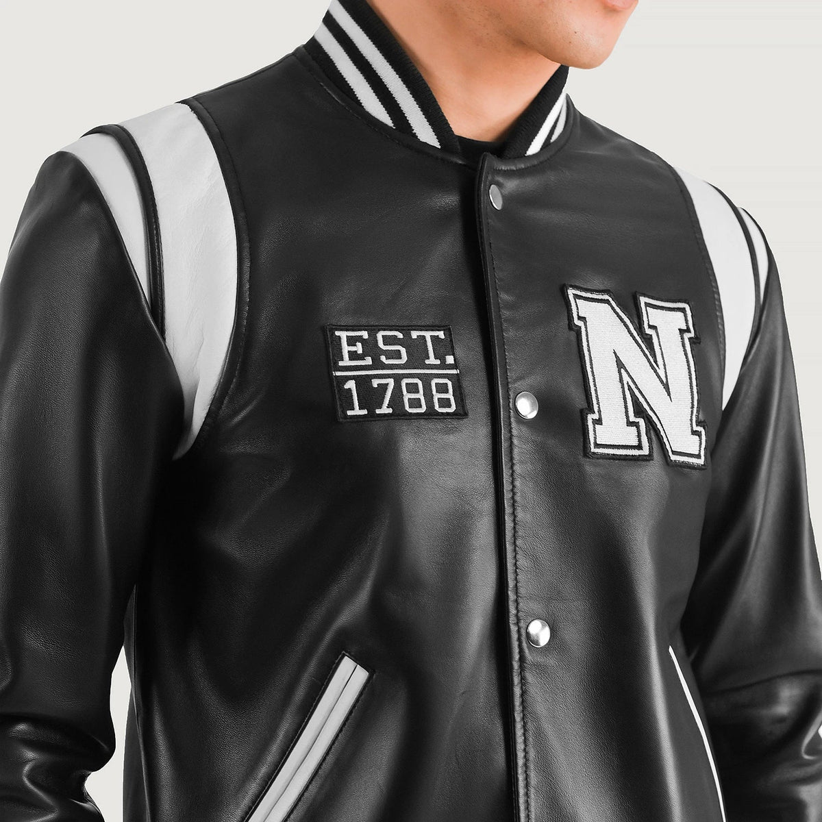 Nærbillede of Varsity & Snap Button Hardware on Liberte New York Black Leather Varsity Jacket