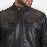 Close-Up Detail of Band with snap button &amp; Zipper Hardware on Rustic Black Leather Biker Jacket