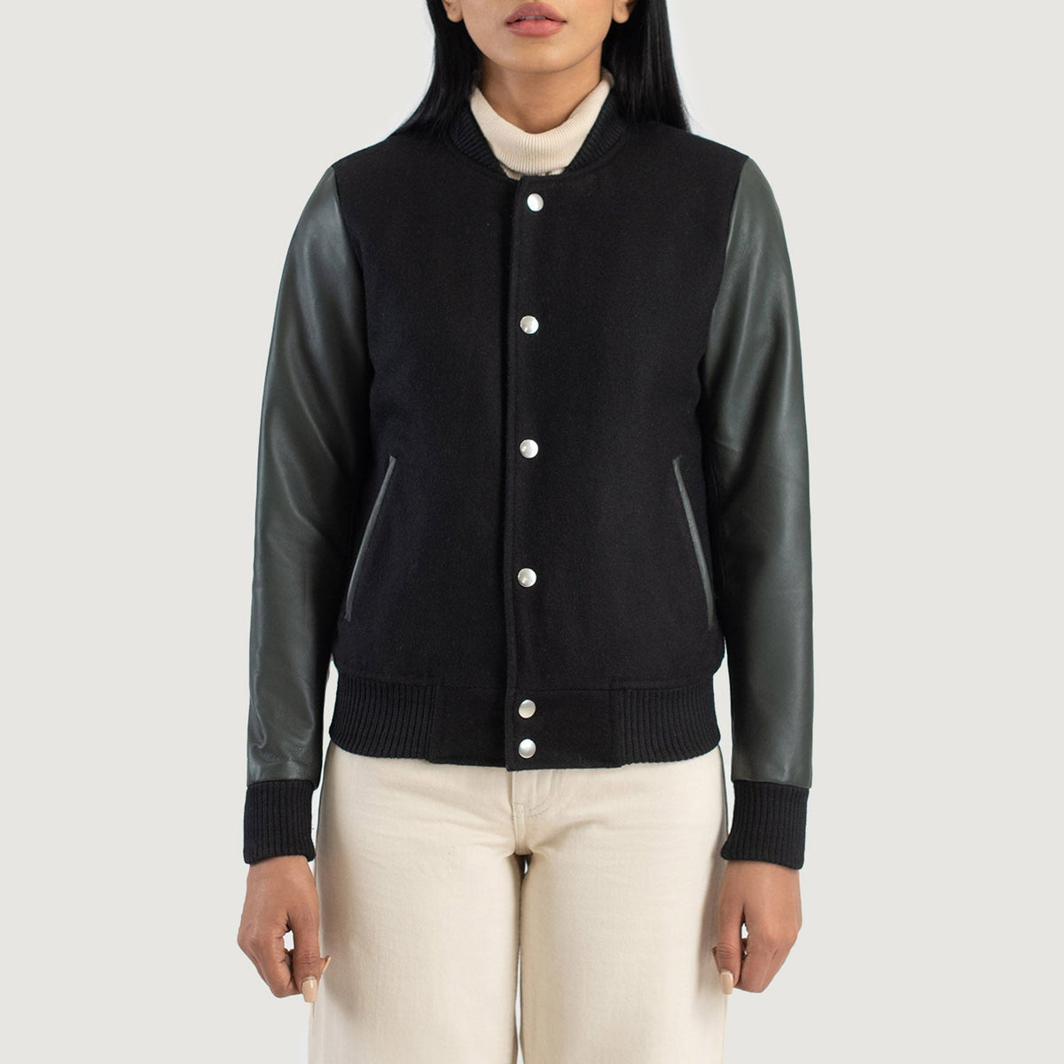 Close-Up Detail of Varsity &amp; Snap Buttons Hardware on Savant Green Hybrid Varsity Jacket